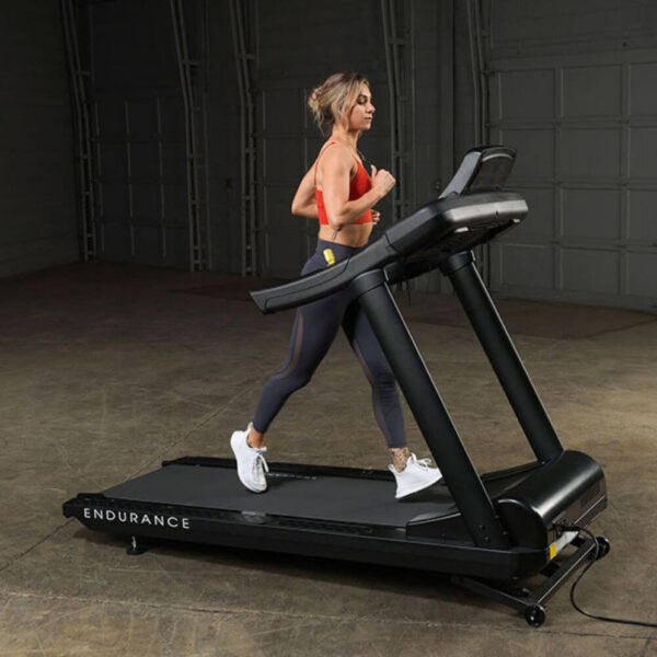 Body-Solid_T150_Commercial_Treadmill_Side_View_Female_Model_994x994 Endurance Commercial Treadmill